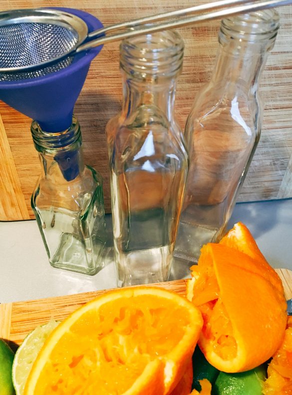 Orangen, Limetten ausgepresst für zuckerfreien Ingwersirup